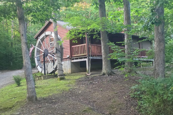 Cabin with its water wheel and deck