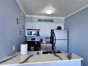 Fridge, microwave, oven, stovetop