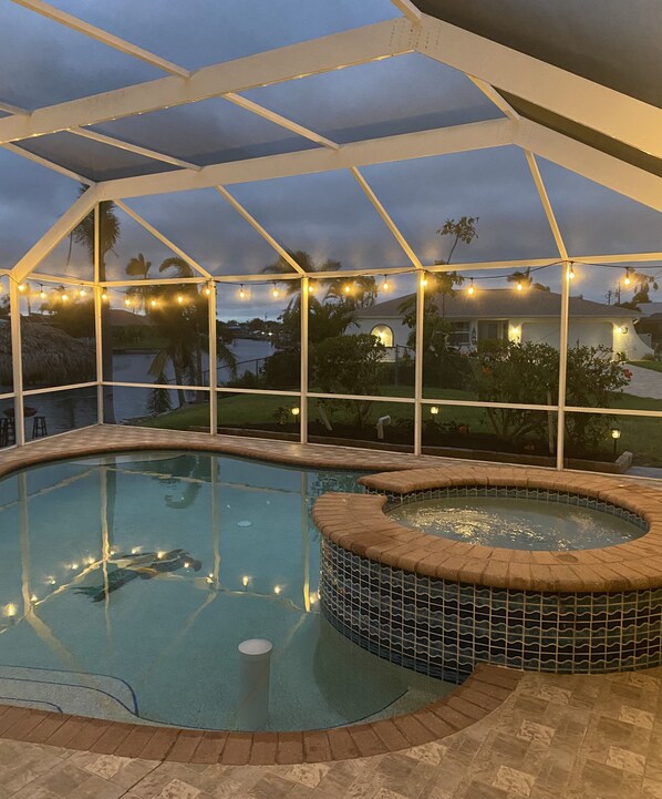 Outdoor pool, a heated pool - Bikini Bottom is a Beautiful South East Cape Coral canal front home. (Cape Coral)