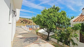 Quarto luxo, vista para o jardim | Vista do quarto