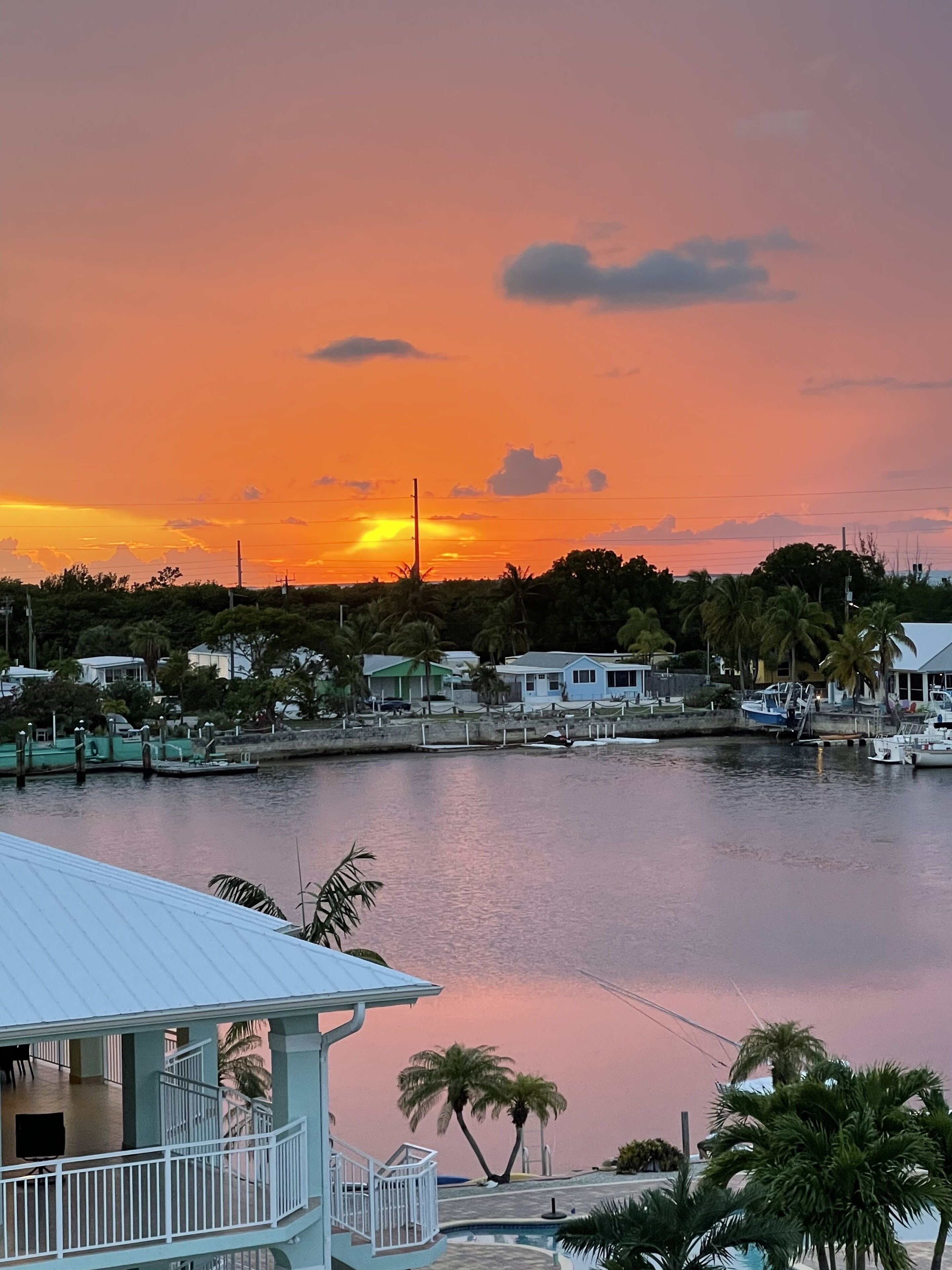 Endless Waterfront Rooftop Sunsets with Private Dock 