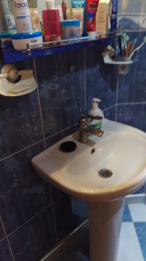 Shower, towels, soap, shampoo