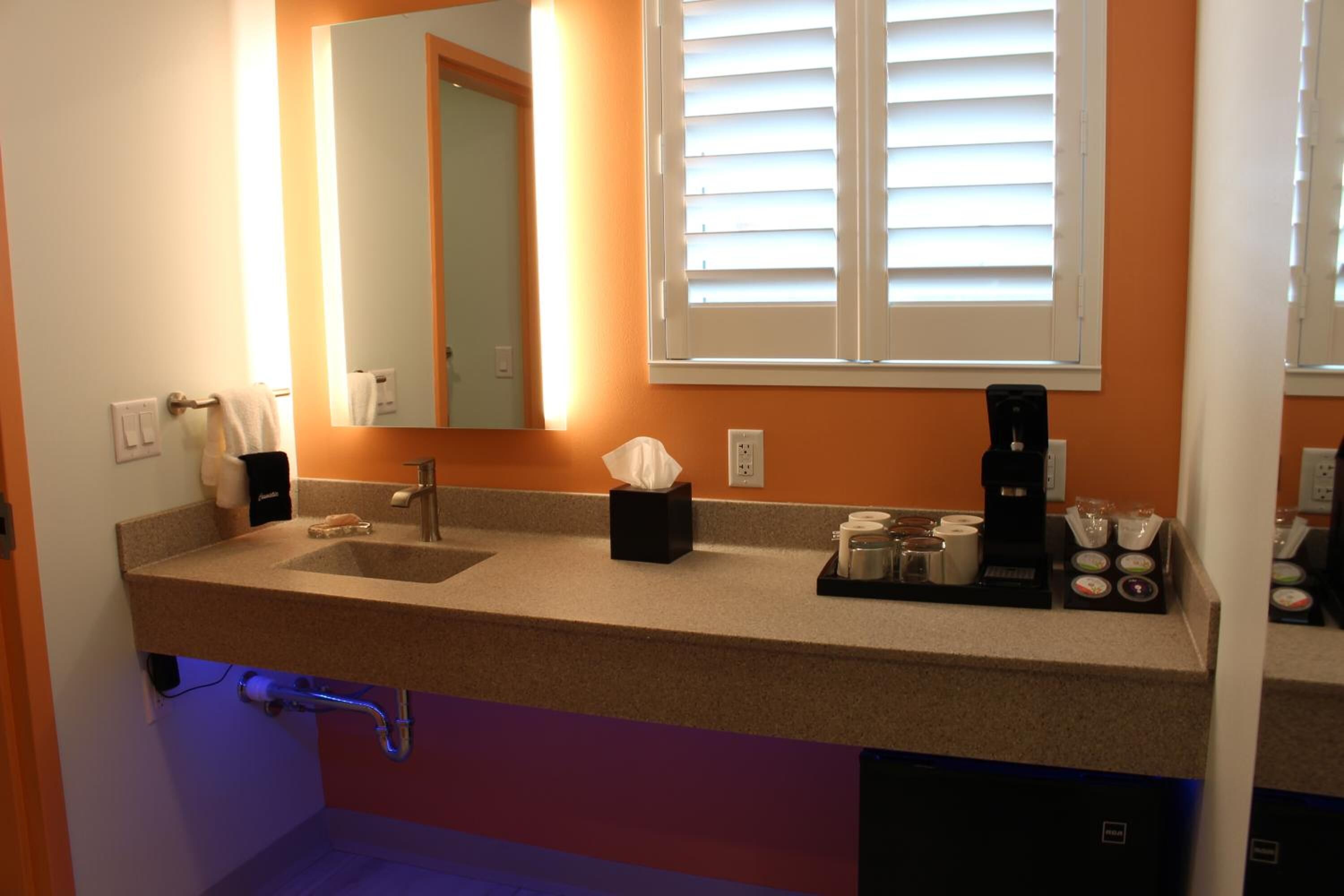 eco-friendly toiletries, hair dryer, towels, soap