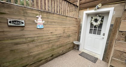 Lower level apt in Spectacular Log Home Estate