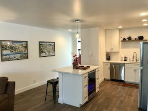 Microwave, dishwasher, coffee/tea maker, cookware/dishes/utensils