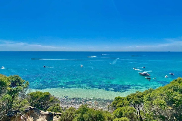 Na praia, espreguiçadeiras