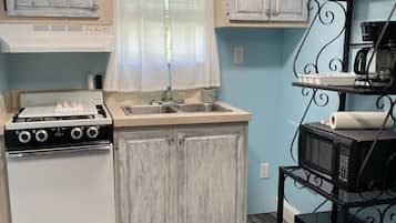 Fridge, microwave, coffee/tea maker, toaster