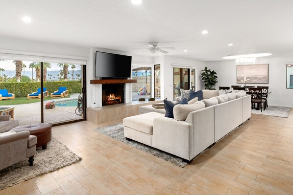 Smart TV, fireplace, table tennis, books