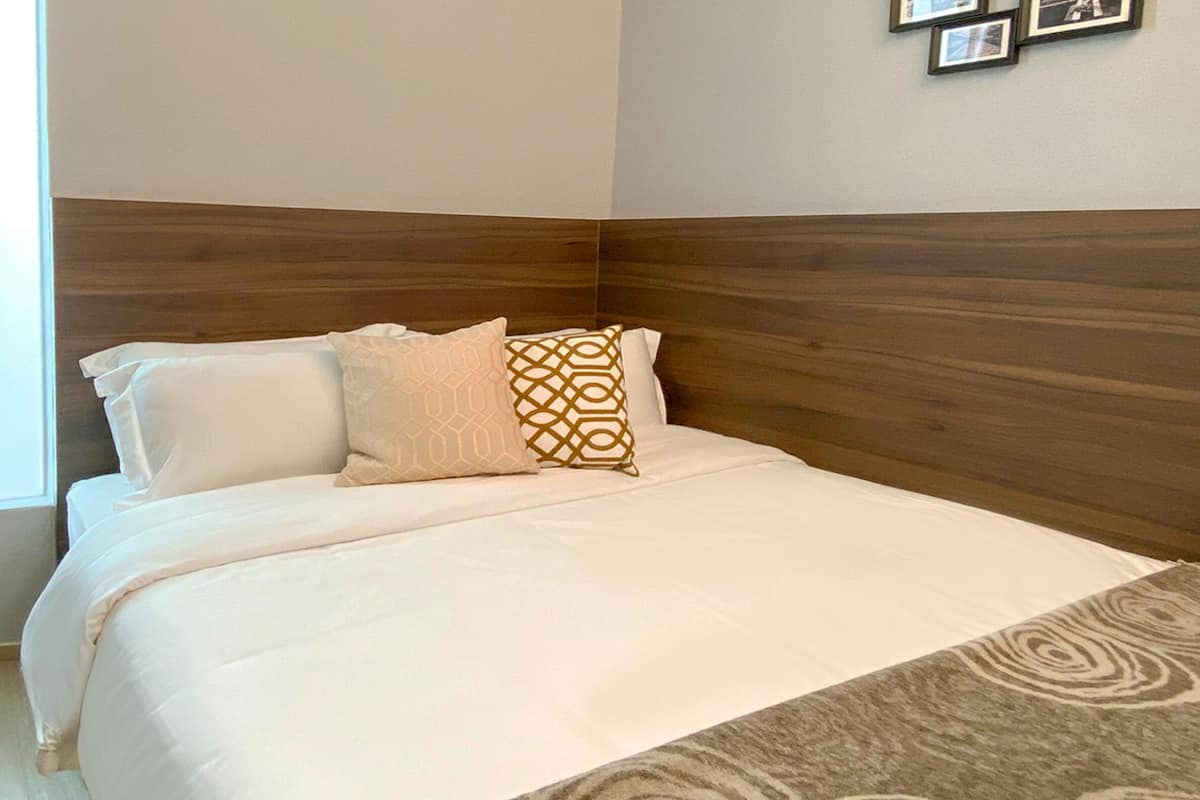 Desk, laptop workspace, free WiFi, bed sheets