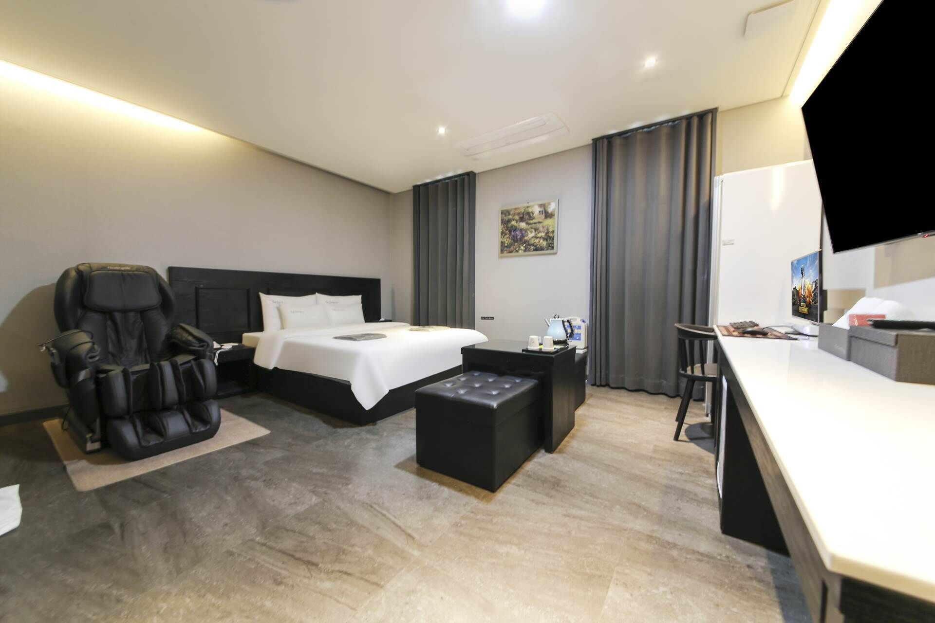 Massage Room | Premium bedding, down comforters, individually decorated