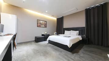 Habitación estándar | Ropa de cama de alta calidad, edredón y decoración personalizada