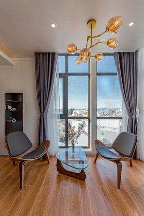 Executive Double Room, Sea View | Living area | 43-inch Smart TV with cable channels, TV - The Empire Hotel (Phu Quoc)