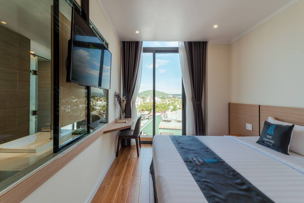 Deluxe Double Room, River View | Minibar, desk, free WiFi