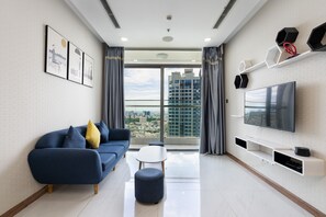 City Apartment, 2 Bedrooms, Balcony, City View (Sens House) | Living area | 49-inch Smart TV with digital channels, TV - Sens House Saigon – Serviced Apartments in Vinhomes Central Park (Ho Chi Minh City)