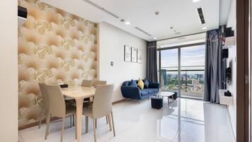 City Apartment, 2 Bedrooms, Balcony, City View (Sens House) | Living area | 49-inch Smart TV with digital channels, TV