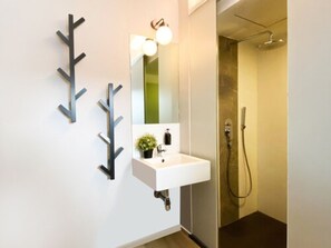 Shower, rainfall showerhead, hair dryer, towels