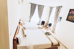 Family Quadruple Room | Desk, iron/ironing board, free WiFi, bed sheets - My Hien Hotel (Da Lat)
