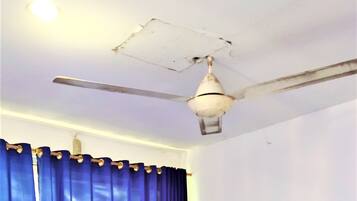Standard Room, Fan | Desk, bed sheets
