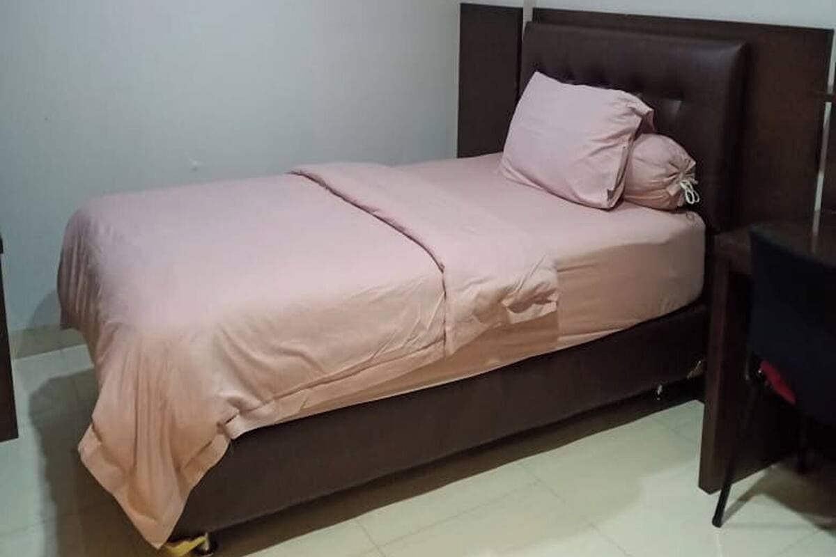 Habitación individual Deluxe | Wifi gratis y ropa de cama