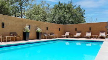 Outdoor pool, open 8:30 AM to 8:30 PM, pool loungers