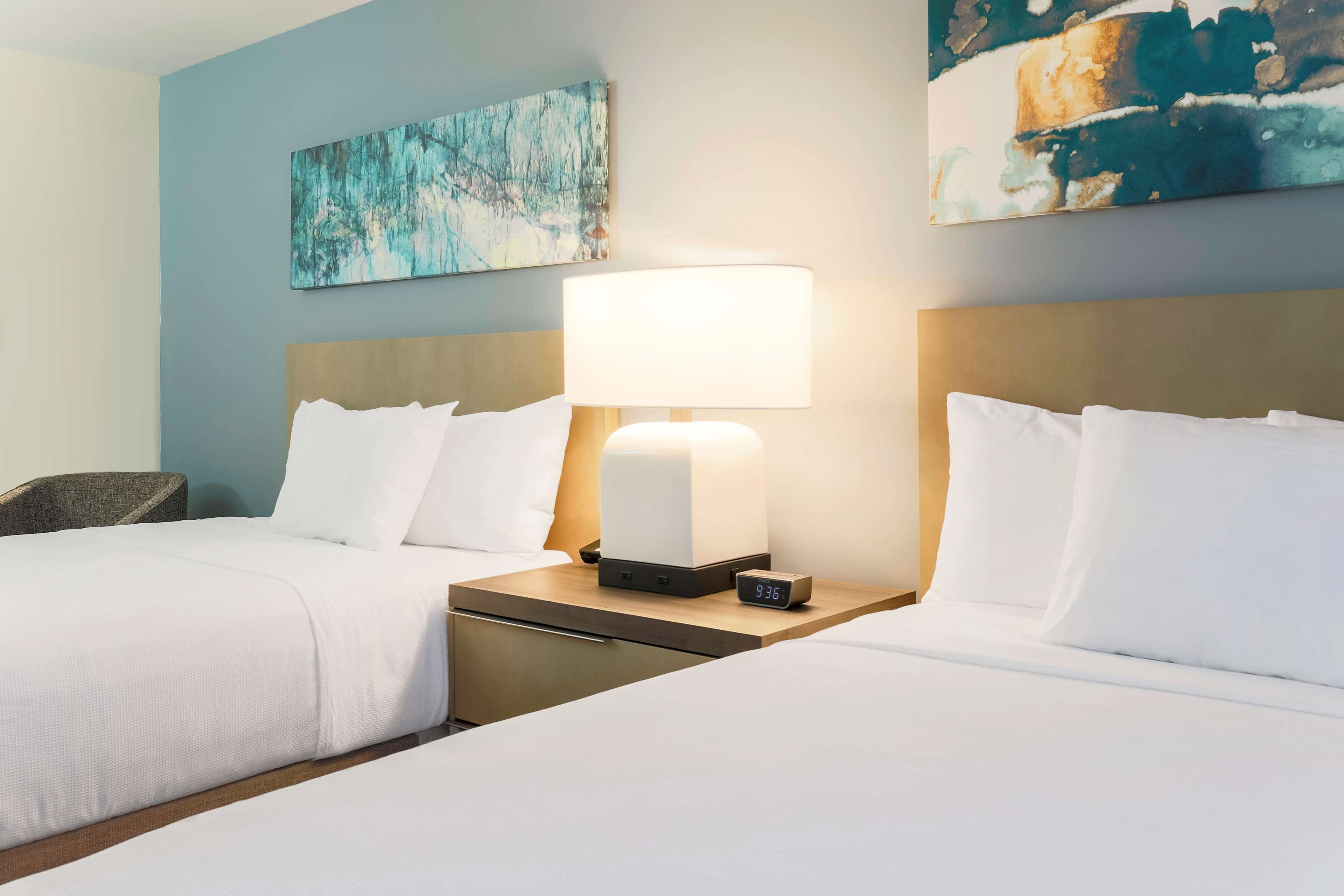 hypo-allergenic bedding, desk, laptop workspace, blackout curtains