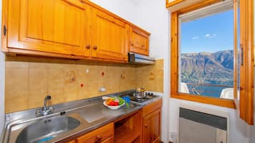 Family Apartment, Multiple Bedrooms, Mountainside (Appartamento Secrel 7) | Dapur peribadi | Peti sejuk, dapur, pembancuh kopi/teh, cerek elektrik