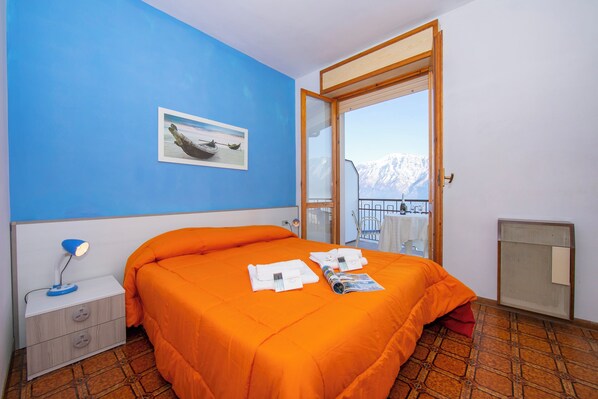Familienapartment, Mehrere Schlafzimmer, Bergseite (Appartamento Secrel 8) | 1 Schlafzimmer, kostenloses WLAN, Bettwäsche