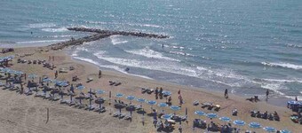 Two-room apartment, large terrace, sea front, floor 1 (Pink)