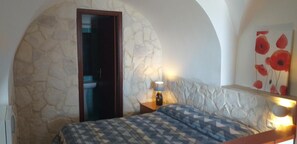 1 dormitori i roba de llit 