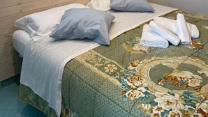 1 غرفة نوم وملاءات أسرّة