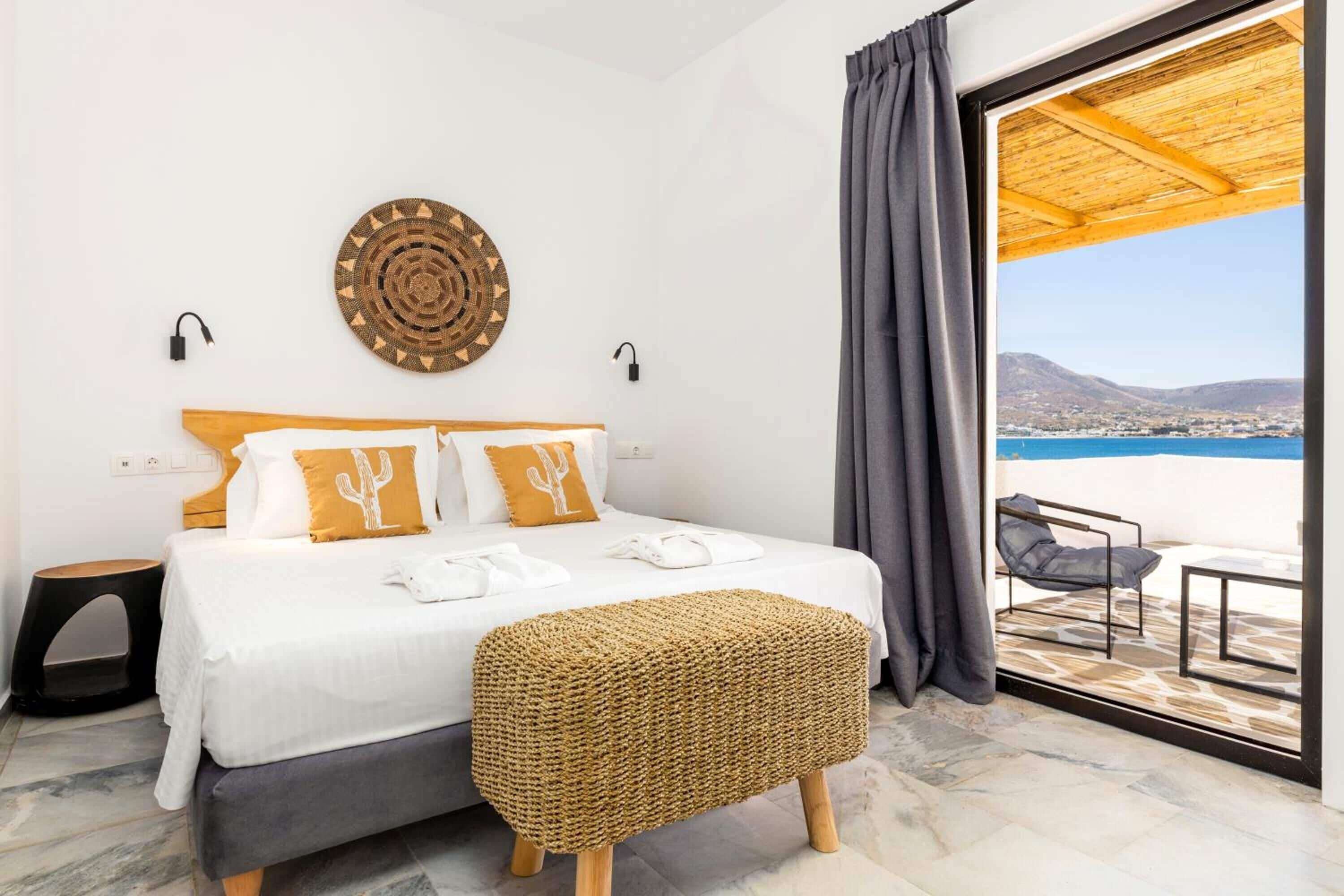 Habitación superior, vista al mar | Ropa de cama hipoalergénica y caja de seguridad en la habitación 