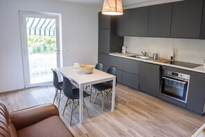 Fridge, oven, dishwasher, dining tables - N230 - Numana, brand new three-room apartment with garden (Numana)