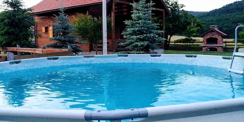 Maison de vacances avec piscine extérieure et jardin