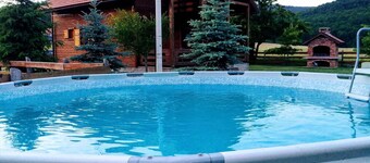 Holiday home with outdoor pool and garden