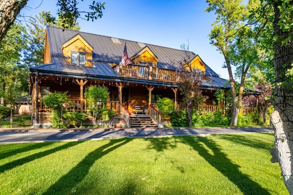 Front porch, upper deck and lawn area in front of home