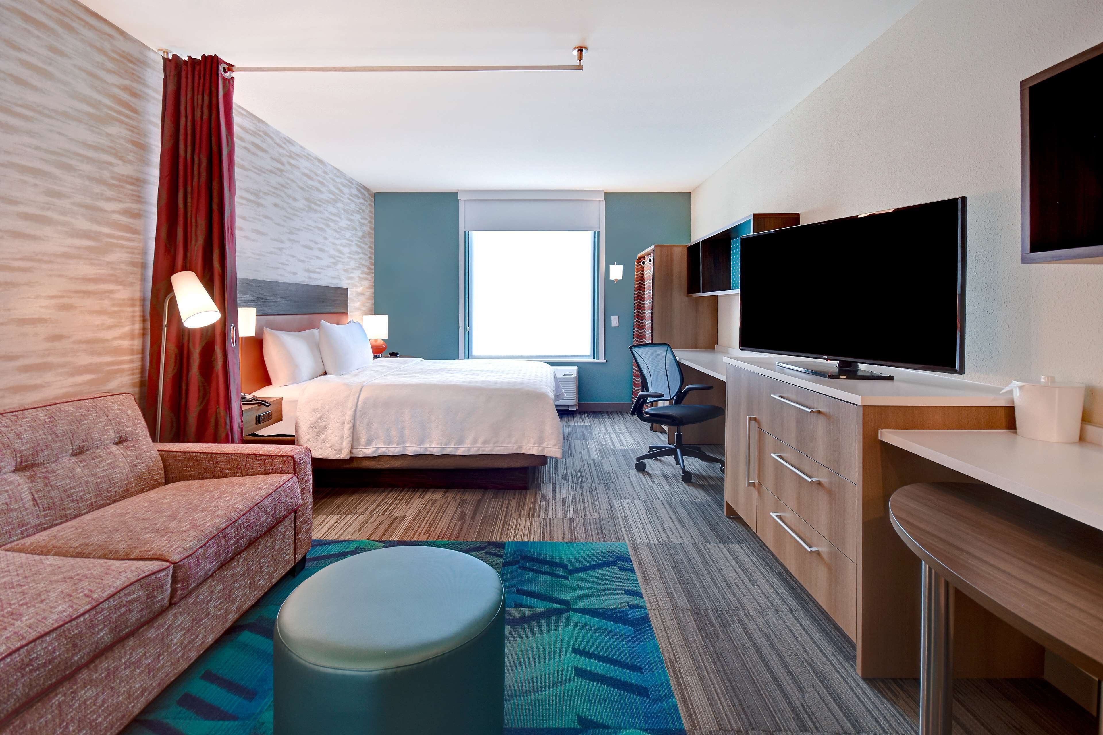 studio suite, 1 king bed, non smoking | living area | 49-inch smart tv with satellite channels, tv, netflix