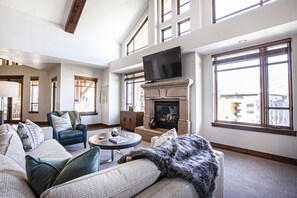Hyatt Centric Three Bedroom #456 | Living area | Flat-screen TV, fireplace, DVD player, table tennis - Hyatt at the Canyons by Park City Vacations (Park City)