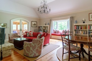 TV, fireplace, books