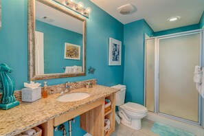 Combined shower/tub, hair dryer, towels, soap