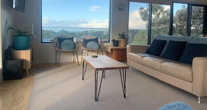 Stunning water views; relaxed coastal atmosphere; multiple entertaining areas