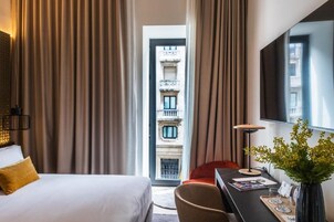 Down duvets, minibar, in-room safe, desk