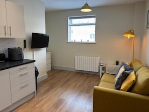 City Apartment | Living area | Flat-screen TV