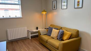 City Apartment | Living area | Flat-screen TV