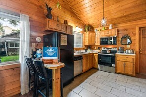 Coffee/tea maker, fridge, microwave, oven