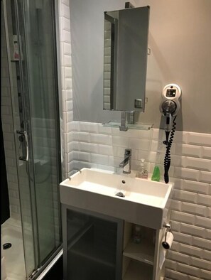 Hair dryer, towels, soap, toilet paper