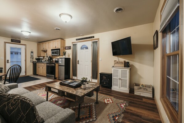 Bright living/dining area with views of downtown Fish Creek - Cozy Cabin! Amazing Location in Fish Creek! Pool! (Fish Creek)