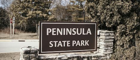 A sign for Peninsula State Park.