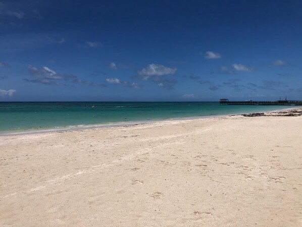 On the beach, sun loungers, beach towels