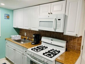 Fridge, microwave, dishwasher, coffee/tea maker