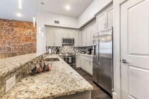 Fridge, microwave, oven, stovetop - SPACIOUS, HISTORIC CHARMER🧡 DOWNTOWN 4 BEDROOM WITH 2 BALCONIES WRAPPED IN WROUGHT IRON (New Orleans)